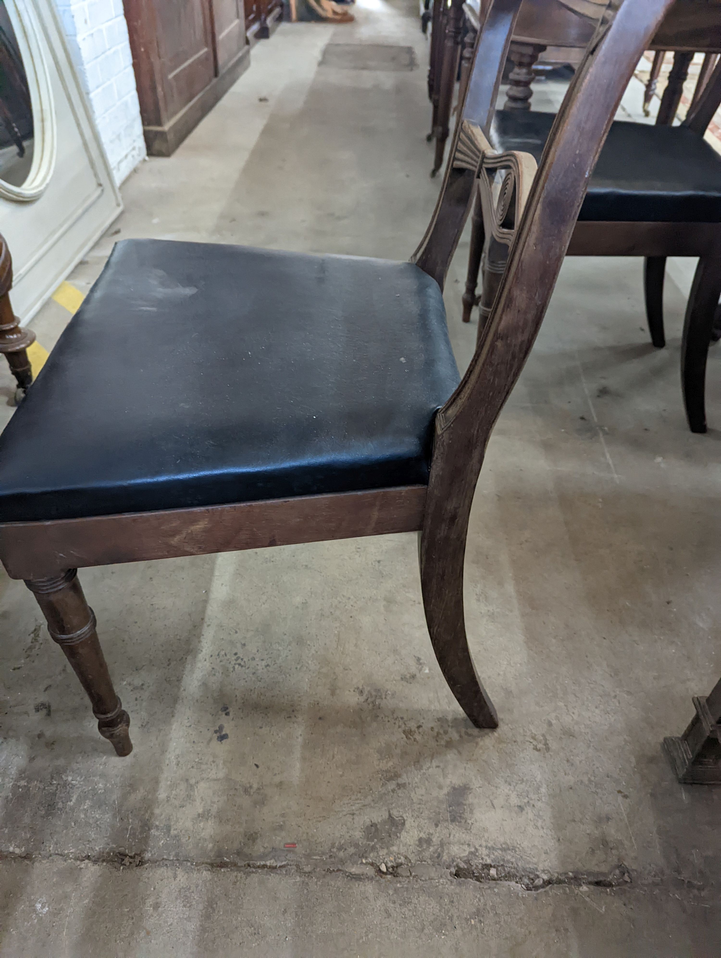 A pair of Regency mahogany dining chairs